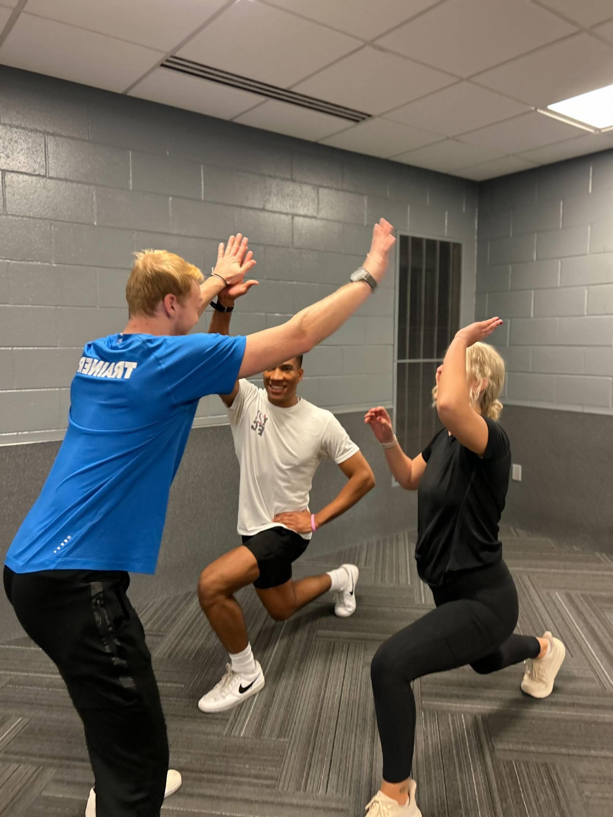 Buddy training session with high fives from Trainer